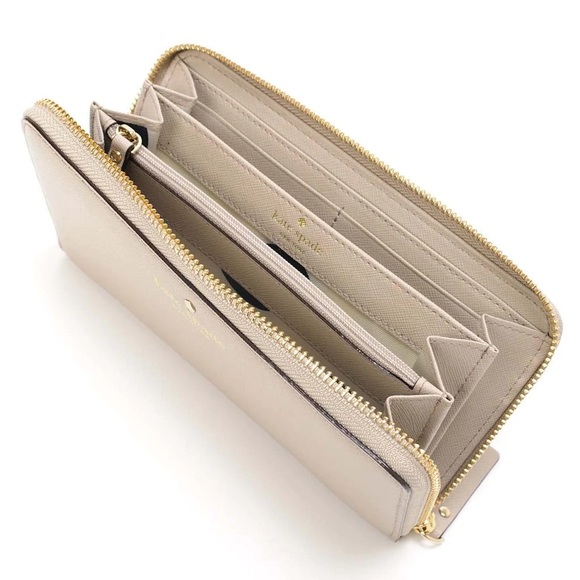 kate spade Handbags - Kate Spade Leather Cedar Street Lacey Wallet